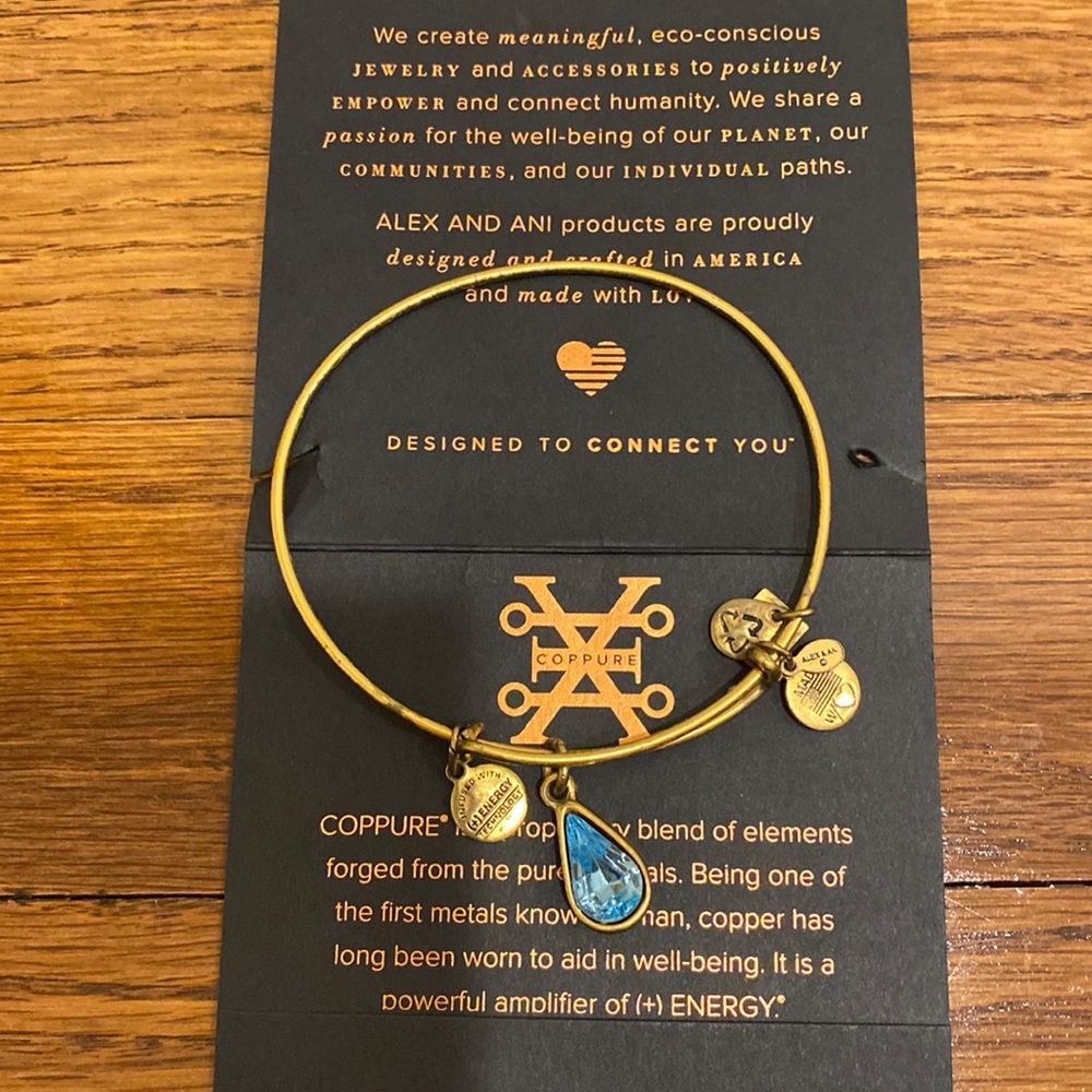 Alex and Ani Gold Blue gem bracelet